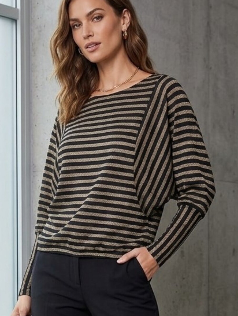 BEBE gold and black top
